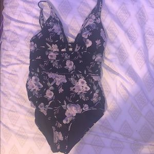 One piece floral bathing suit.